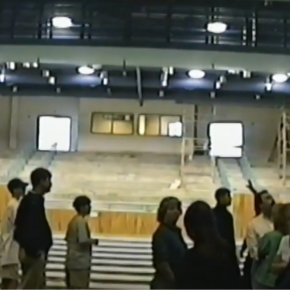 Onlookers observe the construction of Bow High School